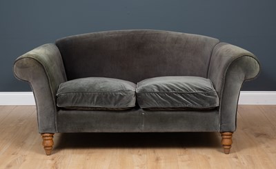 Lot 229 - A contemporary two seater grey upholstered...