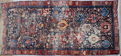 Lot 633 - An antique Persian polychrome carpet with...