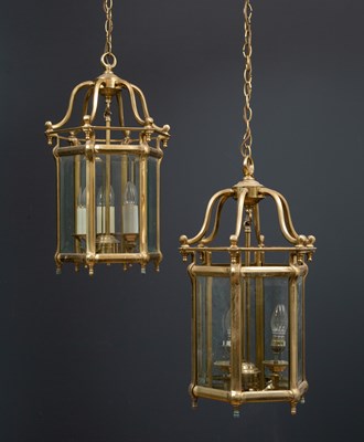 Lot 184 - A pair of brass hexagonal shaped hall lanterns,...