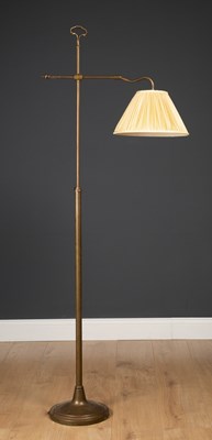 Lot 346 - A brass floor standing lamp of adjustable...