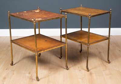 Lot 347 - A pair of brass two tier occasional tables...