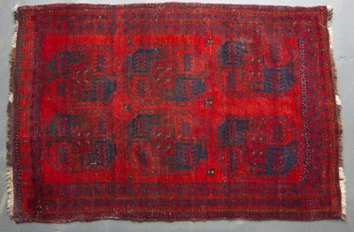 Lot 659 - An Afghan red ground rug 183cm x 126cm and a...