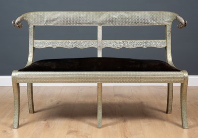 Lot 359 - An Eastern pressed metal mounted settee with...