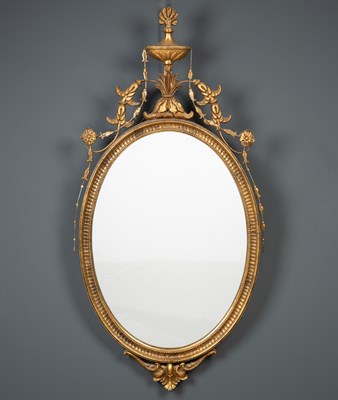 Lot 360 - A Georgian-style giltwood mirror, the oval...