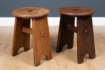 Lot 113 - A pair of Art and Crafts style oak low stools,...