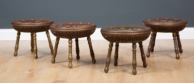 Lot 356 - Four Indian brass stools with engraved and...