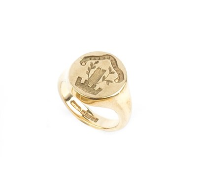 Lot 21 - A 9ct gold signet ring, the oval panel incised...