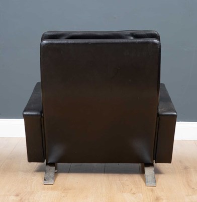 Lot 94 - A Robin Day Leo black leather low armchair and...