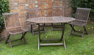 Lot 564 - A Kent teak folding garden table and four...