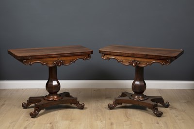 Lot 212 - A pair of early Victorian rosewood fold over...