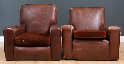 Lot 362 - A set of three brown leather armchairs, the...