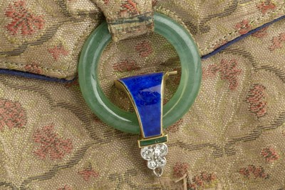 Lot 224 - An Art Deco evening bag by Cartier, the...