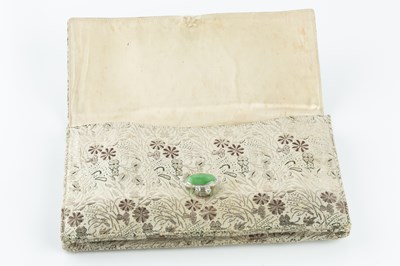 Lot 224 - An Art Deco evening bag by Cartier, the...