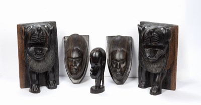 Lot 339 - A West African ebony carved wood head, and two...