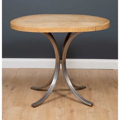 Lot 411 - An oval oak topped garden table, on stainless...