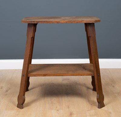 Lot 147 - A Liberty and Co. octagonal oak side table, on...