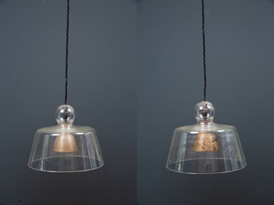 Lot 239 - A pair of Jim Lawrence hanging lamps, the...