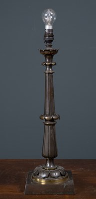 Lot 238 - A bronze table lamp with cast foliate stem and...