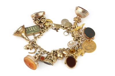 Lot 53 - A charm bracelet, the 18ct gold curb-link...