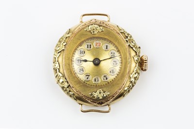 Lot 274 - A lady's watch head, the circular gilt dial...