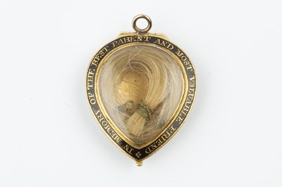 Lot 131 - A Georgian enamel memorial pendant, the...