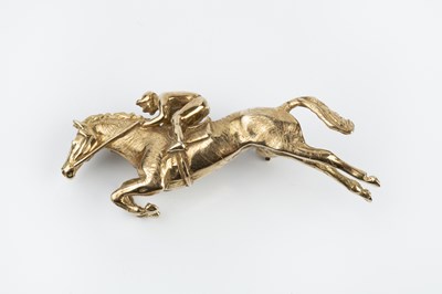 Lot 194 - A 9ct gold horse and jockey brooch by Harriet...