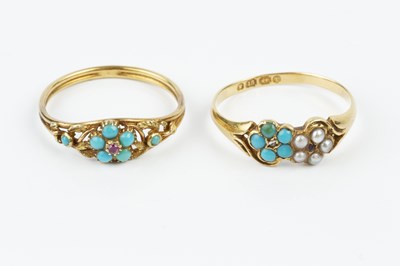Lot 2 - Two Victorian turquoise set dress rings, the...