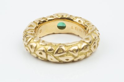 Lot 165 - An emerald set band ring by Chaumet, decorated...