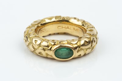 Lot 165 - An emerald set band ring by Chaumet, decorated...