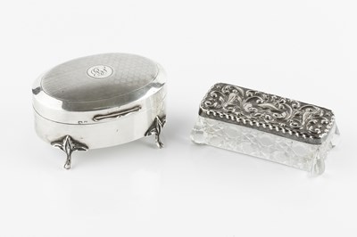 Lot 581 - A silver oval trinket box, the hinged cover...