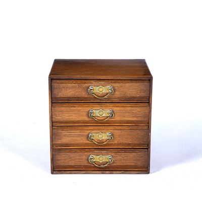 Lot 99 - Oak tabletop chest of four drawers aesthetic...