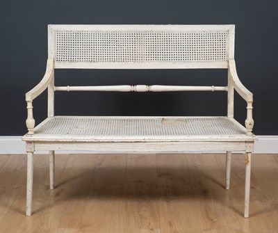 Lot 385a - A white painted wooden and cane two seater...