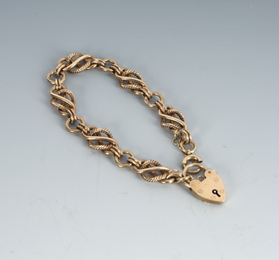 Lot 230 - 9ct gold fancy link bracelet with lobster claw...