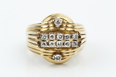 Lot 164 - A diamond set dress ring, of sculptural reeded...