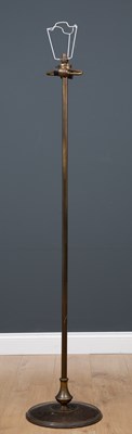 Lot 462 - A brass floor standing lamp standard with...