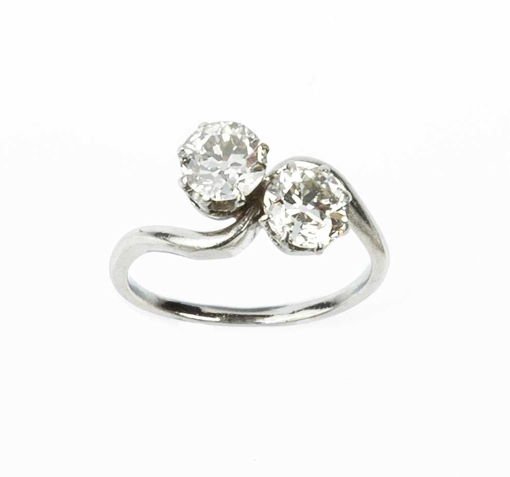 Lot 179 - A diamond two stone crossover ring, obliquely...