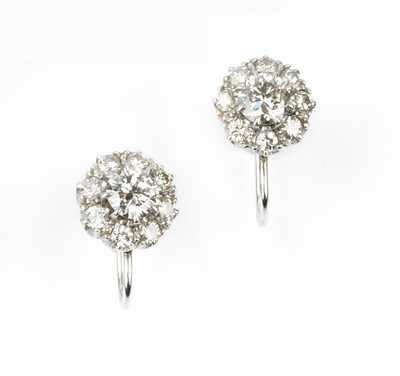 Lot 184 - A pair of diamond cluster ear clips, each a...