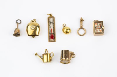 Lot 67 - A collection of pendants and charms, to...