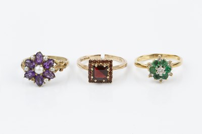 Lot 216 - Three gem set cluster rings, comprising an...