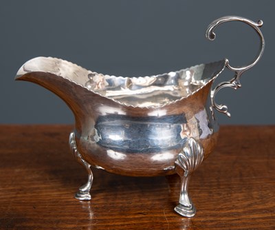 Lot 36 - A George III silver cream jug by John Lambe,...