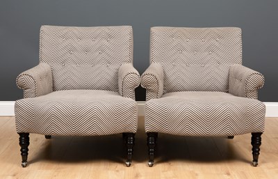 Lot 167 - A pair of modern low armchairs upholstered in...