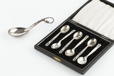 Lot 599 - A silver Arts and Crafts style serving spoon,...