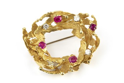 Lot 195 - A ruby and diamond panel brooch by Alan Martin...