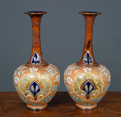 Lot 164 - A pair of long necked Royal Doulton vases, of...
