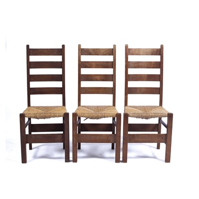 Lot 95 - Heals three oak 'Letchworth' chairs, with...