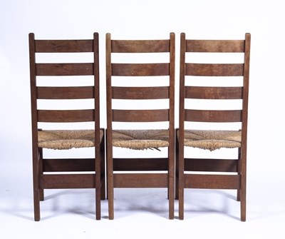 Lot 95 - Heals three oak 'Letchworth' chairs, with...