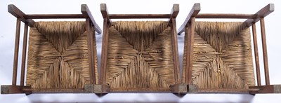 Lot 95 - Heals three oak 'Letchworth' chairs, with...