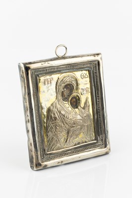 Lot 571 - A Greek orthodox silver cased icon, depicting...