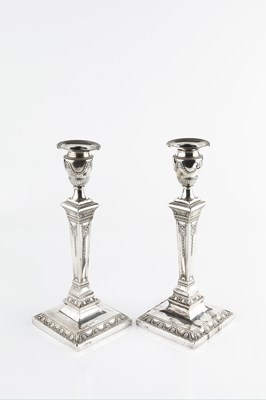 Lot 876 - A pair of late Victorian silver candlesticks,...