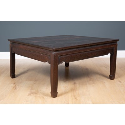 Lot 532 - A Chinese low hardwood centre table with...